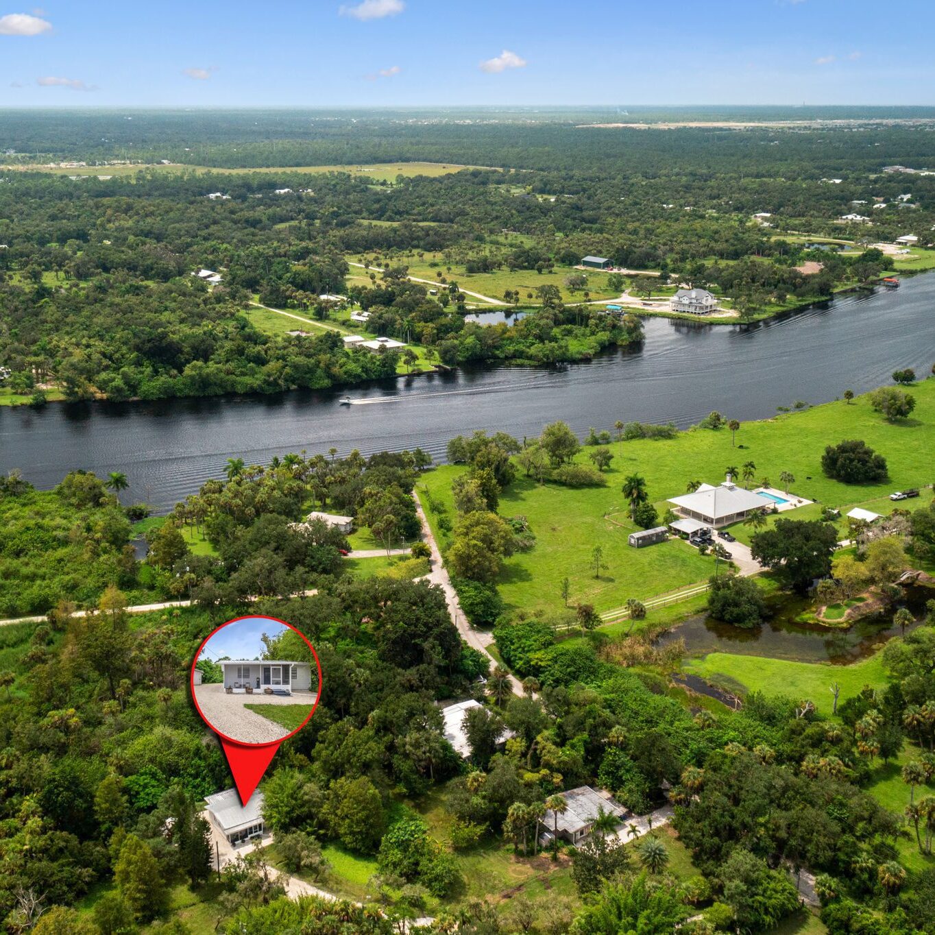 Scenic river and countryside with house highlighted